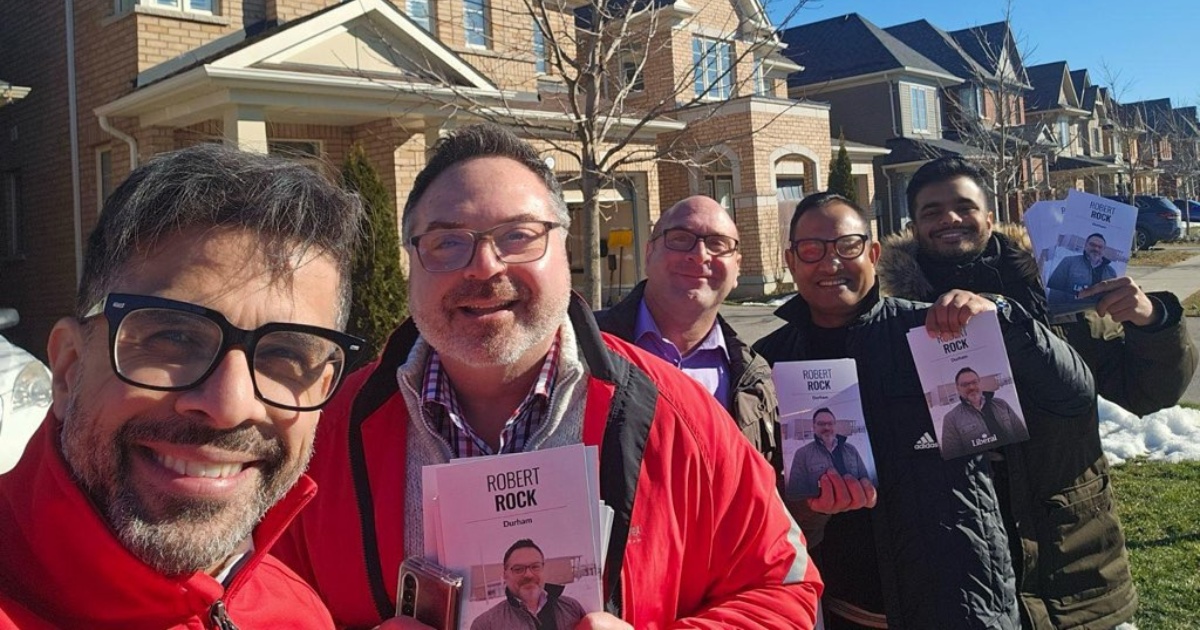 Sachit Mehra, Robert Rock, and Liberal supporters doing door-knocking in Durham
