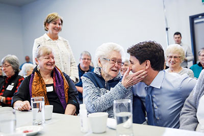 Justin Trudeau speaks with seniors at the Gracelon Civic Centre in St Stephen.